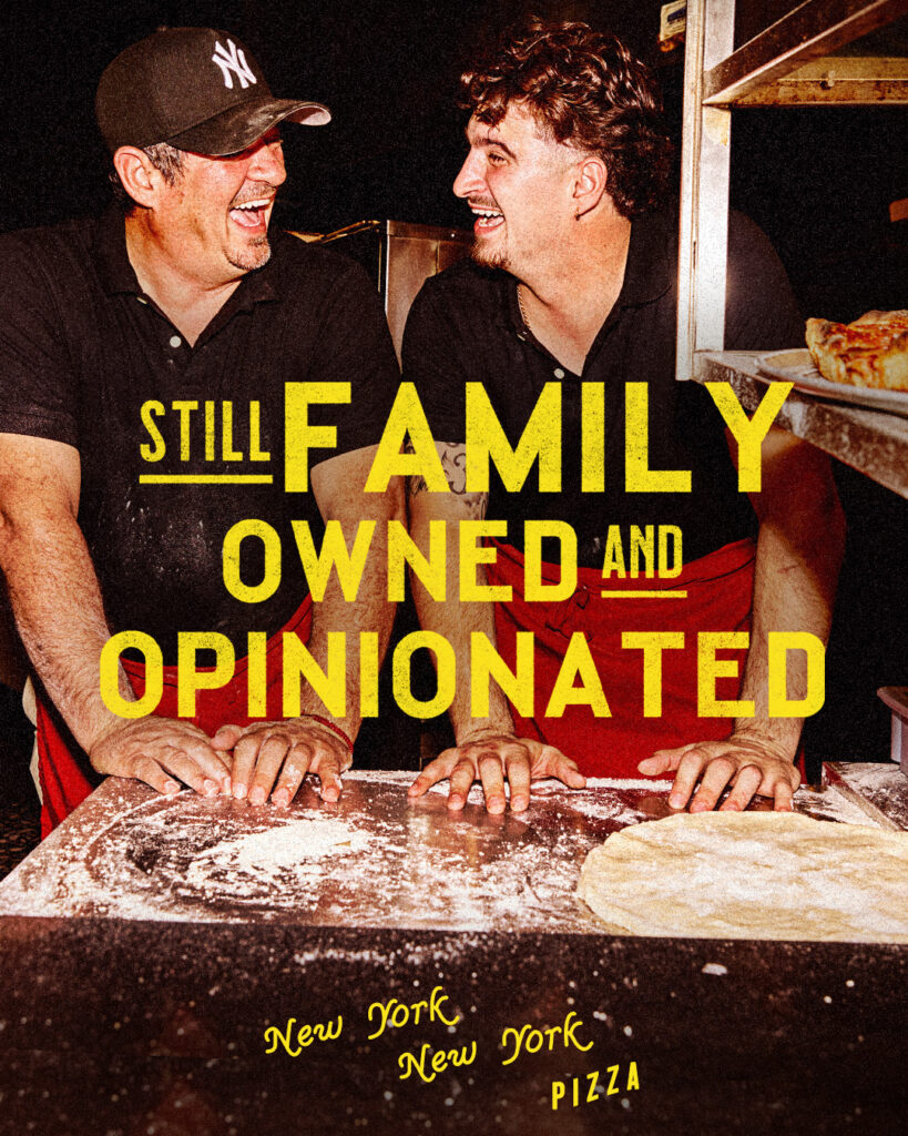 Two smiling men making pizza dough with bold yellow text reading “Still Family Owned and Opinionated – New York, New York Pizza.