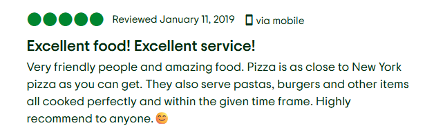 The image shows a 5-star review from January 11, 2019, that reads: “Excellent food! Excellent service!” Very friendly people and amazing food. Pizza is as close to New York pizza as you can get. They also serve pastas, burgers and other items all cooked perfectly and within the given time frame. Highly recommend to anyone. 😊